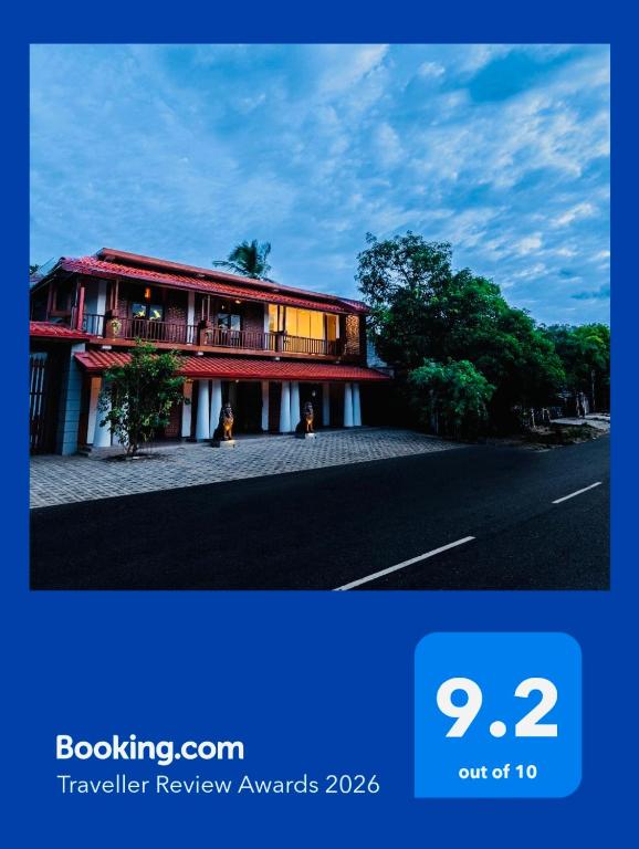 a picture of a house on the side of a road at Golden stars hotel Dambulla in Dambulla