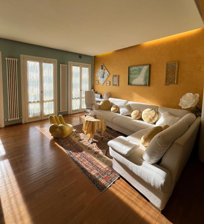 a living room with a couch and a table at Casa Marisa in Monteviale