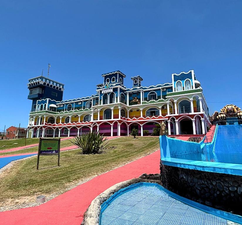 a large building on a field in front at Caverá Country Park in Araranguá