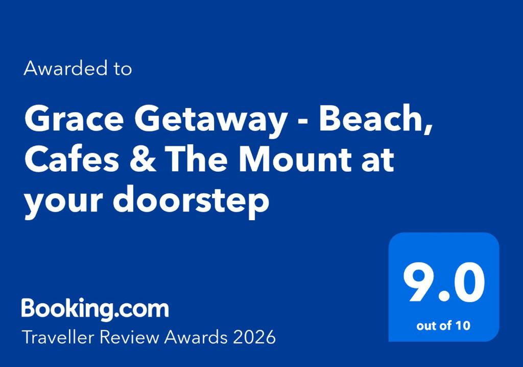 a screenshot of a phone with the words garage getaway beach cakes and the month at Grace Getaway - Beach, Cafes & The Mount at your doorstep in Mount Maunganui