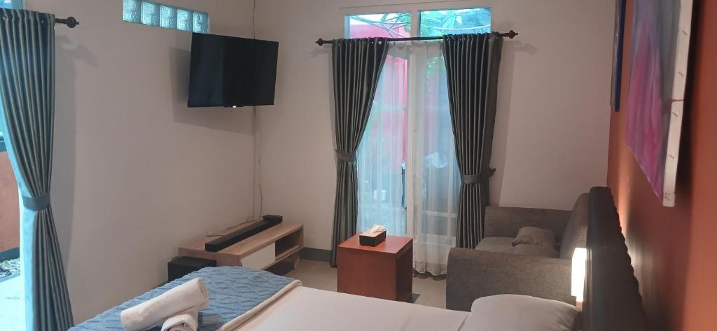 Dewi Sri Guesthouse - Studio With Terrace