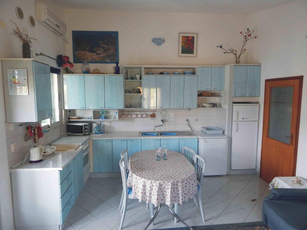 Kuchyň nebo kuchyňský kout v ubytování Apartment Vjeka