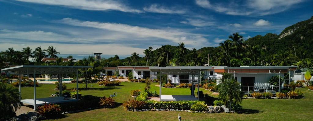 a resort with a lot of plants and trees at This Great Place in Don Sak