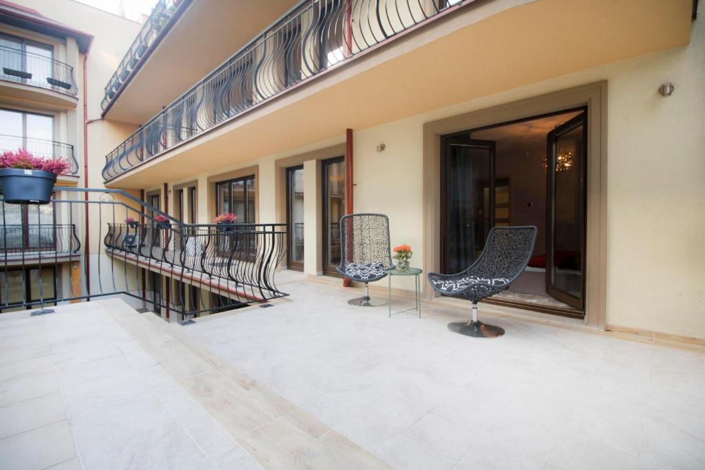 Balkón nebo terasa v ubytování Kings City - Skawińska Apartment