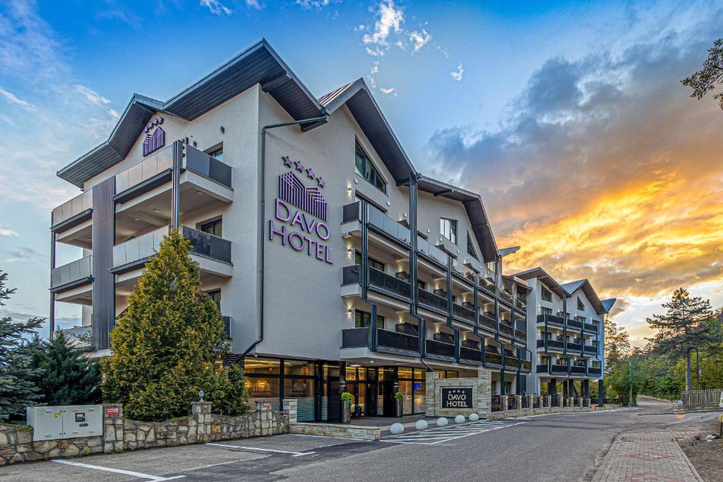 a rendering of the grand hotel at sunset at Davo Hotel in Târgu Neamț