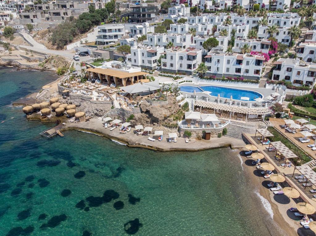 an aerial view of a resort with a swimming pool at YAZ Yalıkavak in Yalıkavak