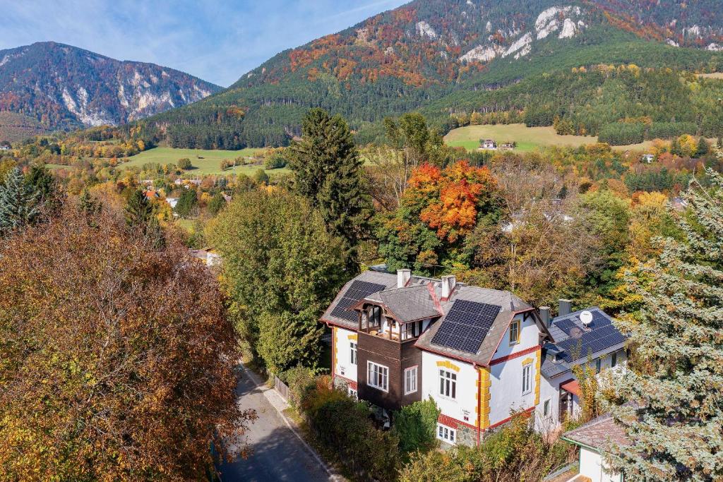 an aerial view of a house with solar panels on its roof at Landhaus Dodo in Payerbach