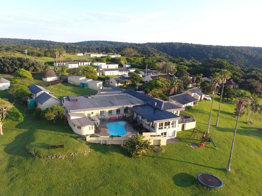 an aerial view of a large house with a pool at THE HAVEN HOTEL in Mpume