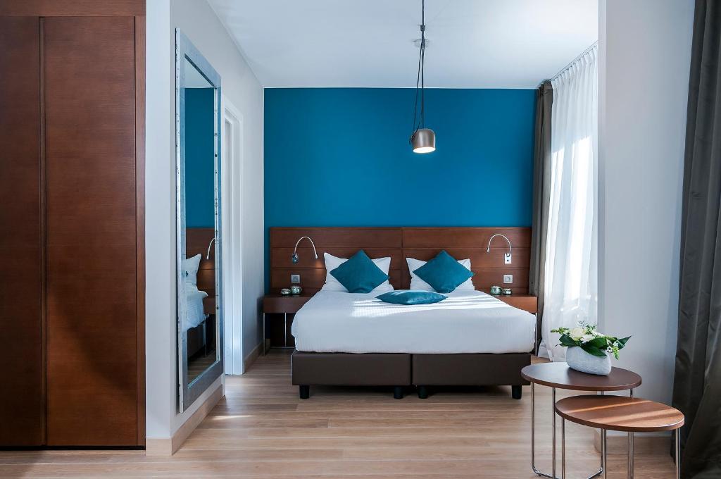Postel nebo postele na pokoji v ubytování Aparthotel Residence Agenda