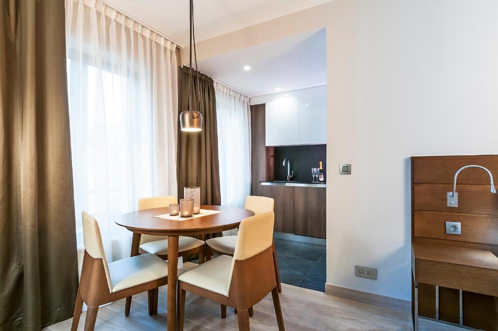 TV a/nebo společenská místnost v ubytování Aparthotel Residence Agenda