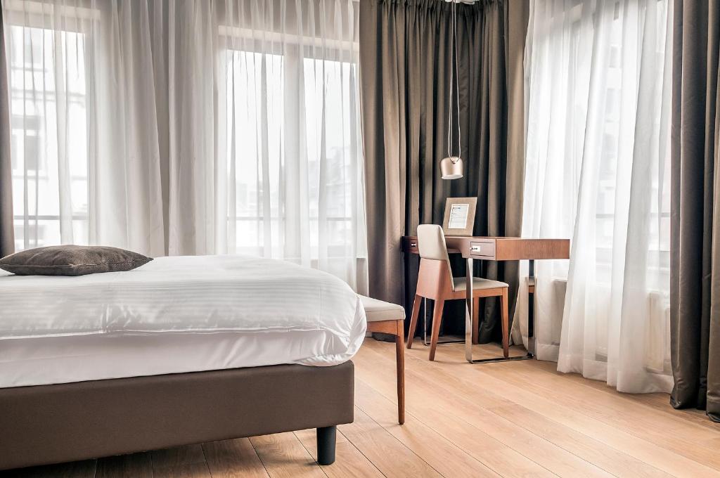 Postel nebo postele na pokoji v ubytování Aparthotel Residence Agenda