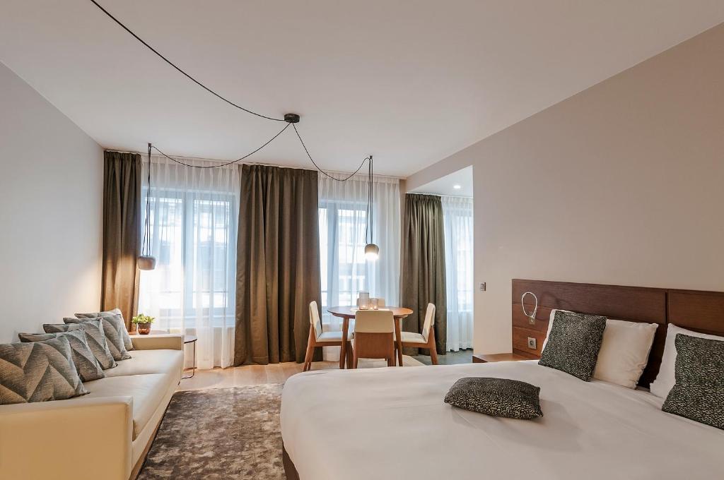 Postel nebo postele na pokoji v ubytování Aparthotel Residence Agenda
