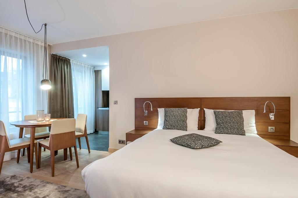 Postel nebo postele na pokoji v ubytování Aparthotel Residence Agenda