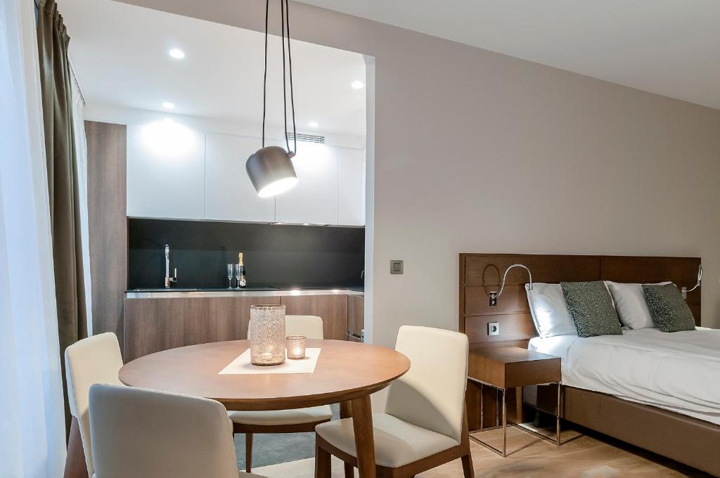 Postel nebo postele na pokoji v ubytování Aparthotel Residence Agenda