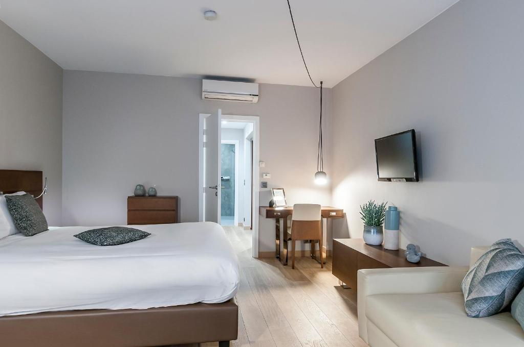 Postel nebo postele na pokoji v ubytování Aparthotel Residence Agenda