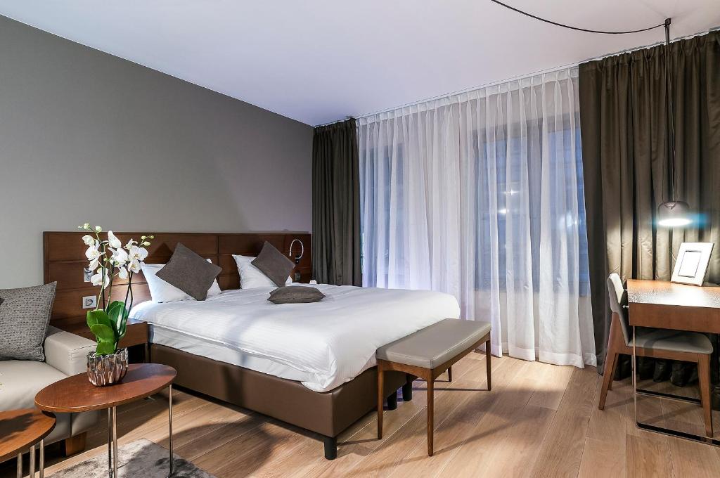 Postel nebo postele na pokoji v ubytování Aparthotel Residence Agenda
