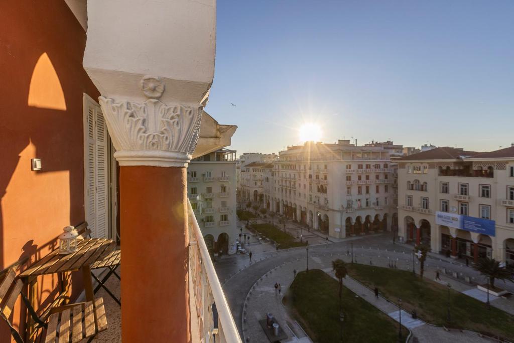 a view of a city street from a balcony at vintege style apartment in Thessaloniki