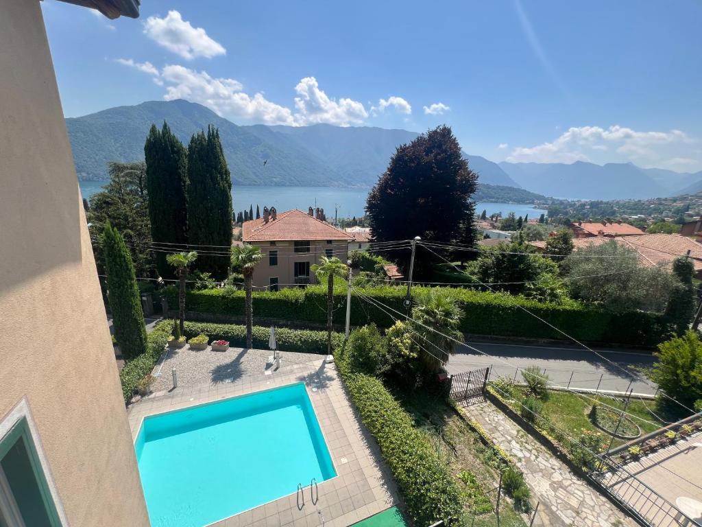 a view of a house with a swimming pool at Dilly Dally Days - by Satisfactual Property in Tremezzo
