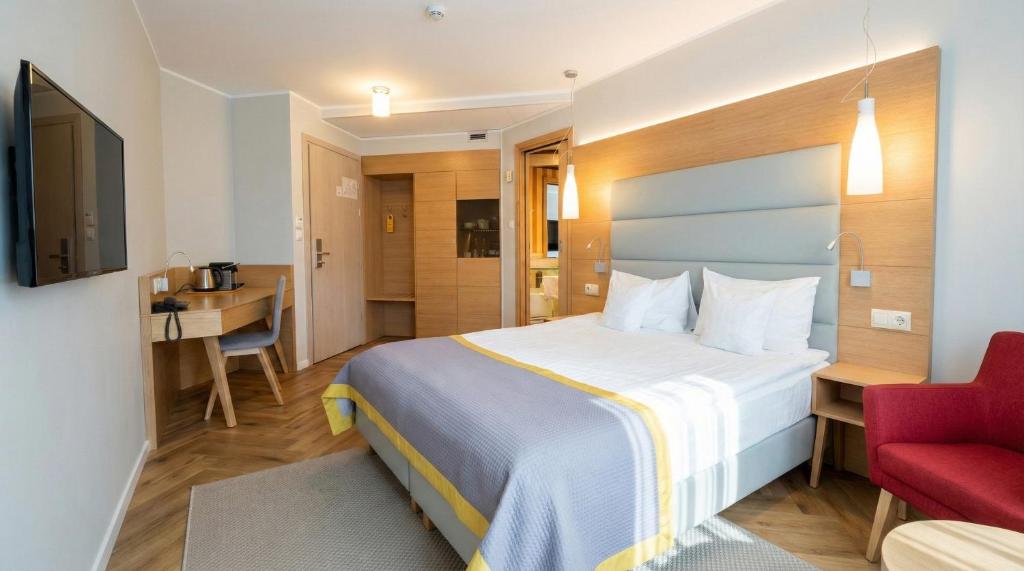 Postel nebo postele na pokoji v ubytování Hotel Vivaldi