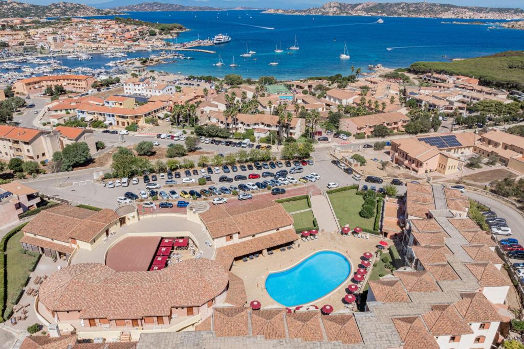 an aerial view of a resort with a pool at Club Esse Posada in Palau