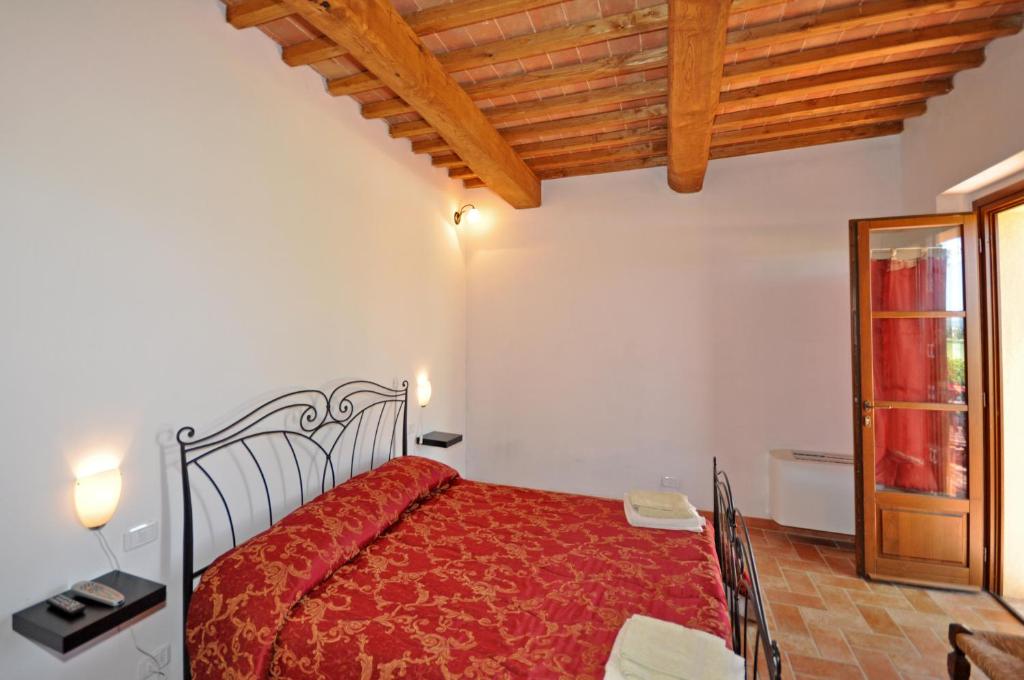 Postel nebo postele na pokoji v ubytování Pienza by PosarelliVillas