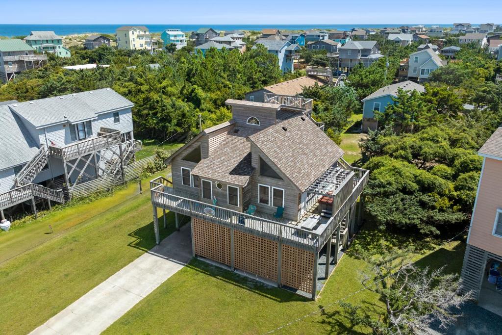 an aerial view of a large house in a residential neighborhood at HISA14: Sunny Daze in Salvo