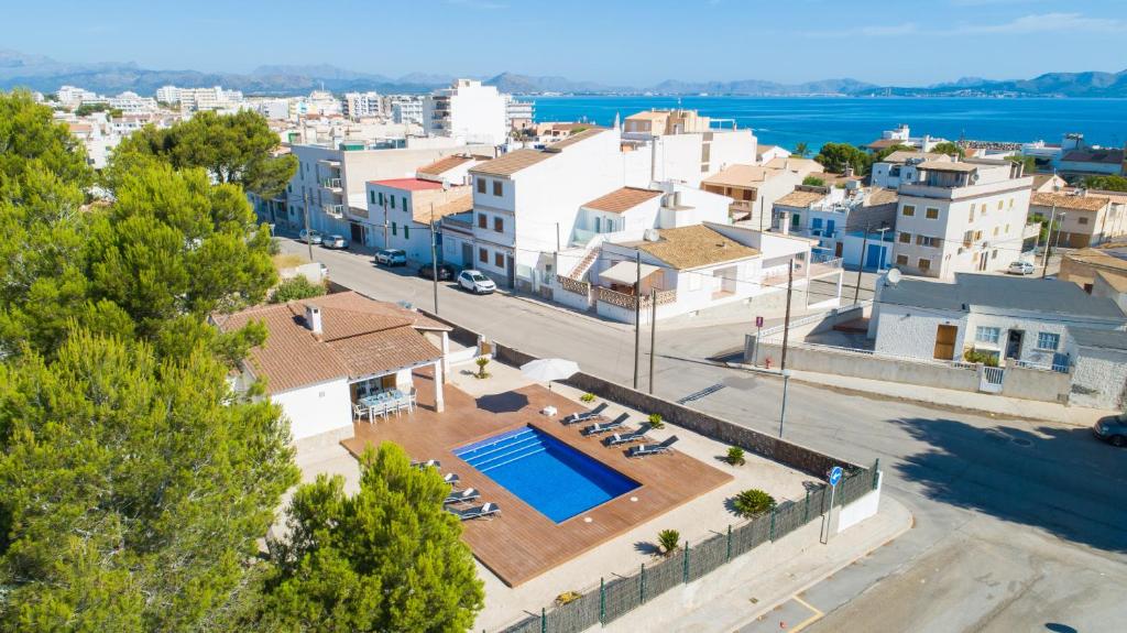an aerial view of a villa with a swimming pool at Villa Anglesos in Can Picafort
