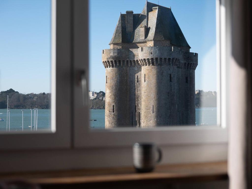 a view of a castle through a window at Rance Solidor in Saint Malo