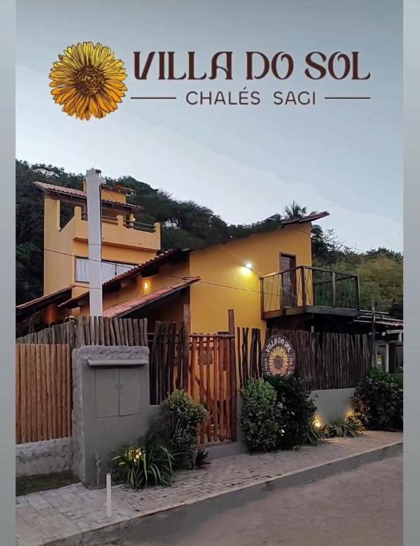 a house with a sign that reads villa do sod climates sat at Villa do Sol Sagi in Baía Formosa