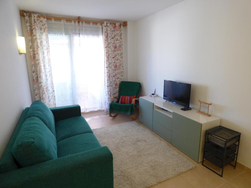 TV a/nebo společenská místnost v ubytování Apartamento Santa Fe