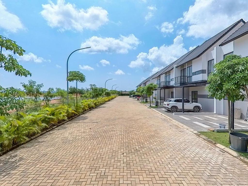 a brick road in front of a building at RV-Villa 4 bedrooms&Private Pool in Pulau Sembakau Kecil