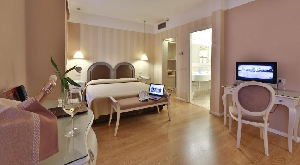 TV a/nebo společenská místnost v ubytování Bonotto Hotel Belvedere
