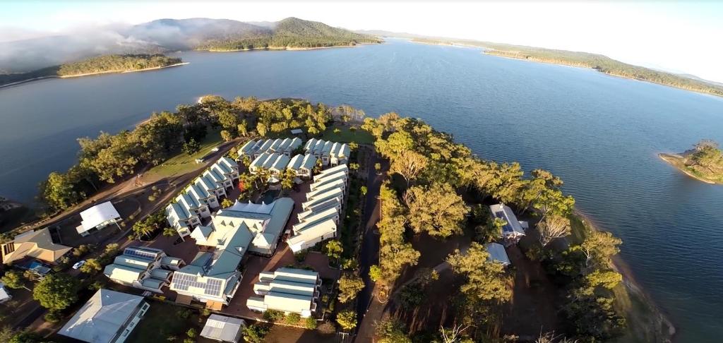 an island in the middle of a lake at Tinaroo Lake Resort in Tinaroo