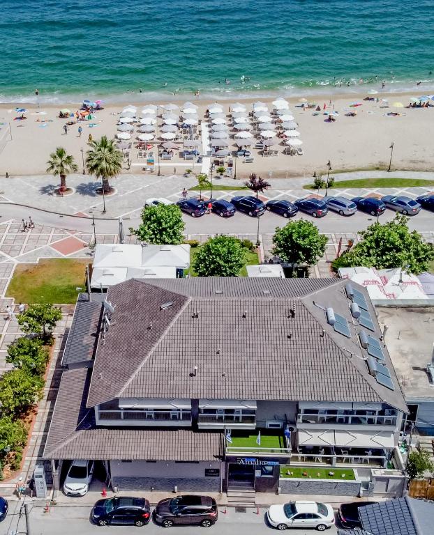 an aerial view of a building and a beach at Amalia Mare in Nea Vrasna