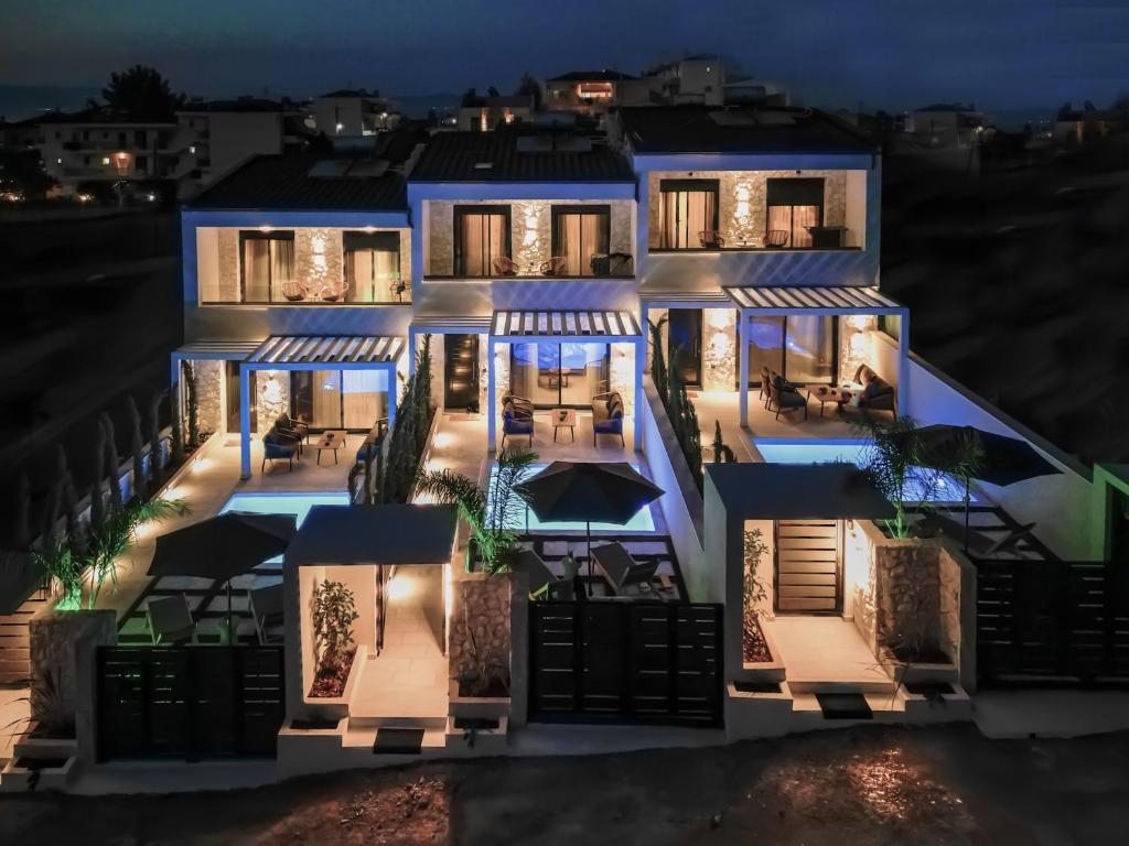 an aerial view of a house at night at Bela Villas in Kallithea Halkidikis