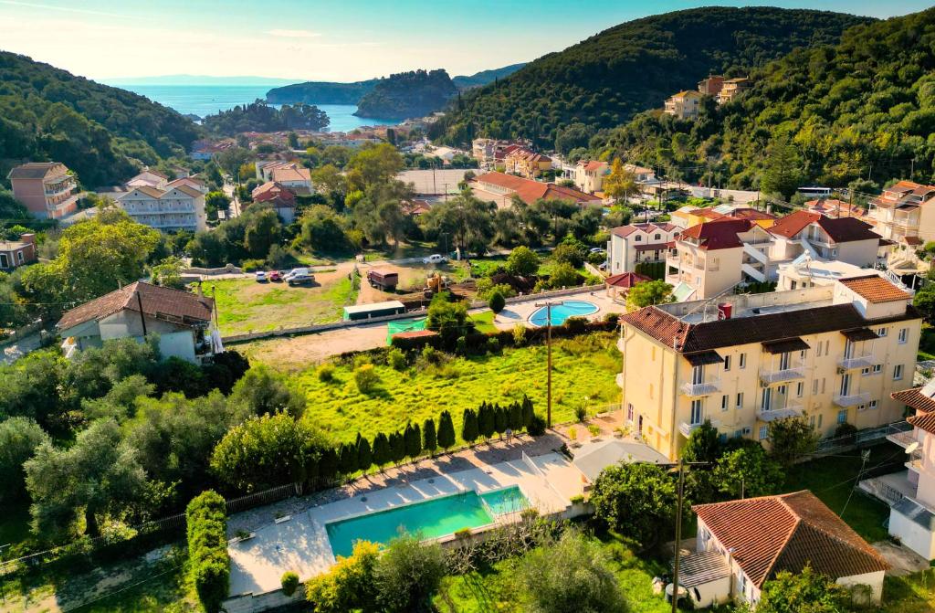 an aerial view of a small town with houses and trees at Oliva Resort View & Swimming pool Studios in Parga