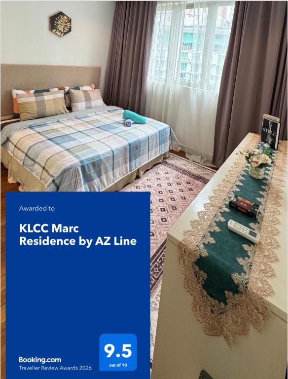 a bedroom with a bed and a table with a bed sidx sidx sidx at KLCC Marc Residence by AZ Line in Kuala Lumpur