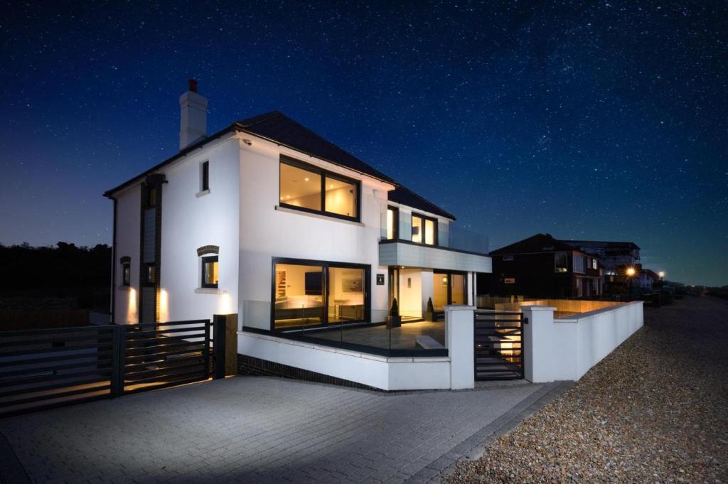 a large white house at night with the sky at 5 Bed in Walmer oc-do022 in Kingsdown