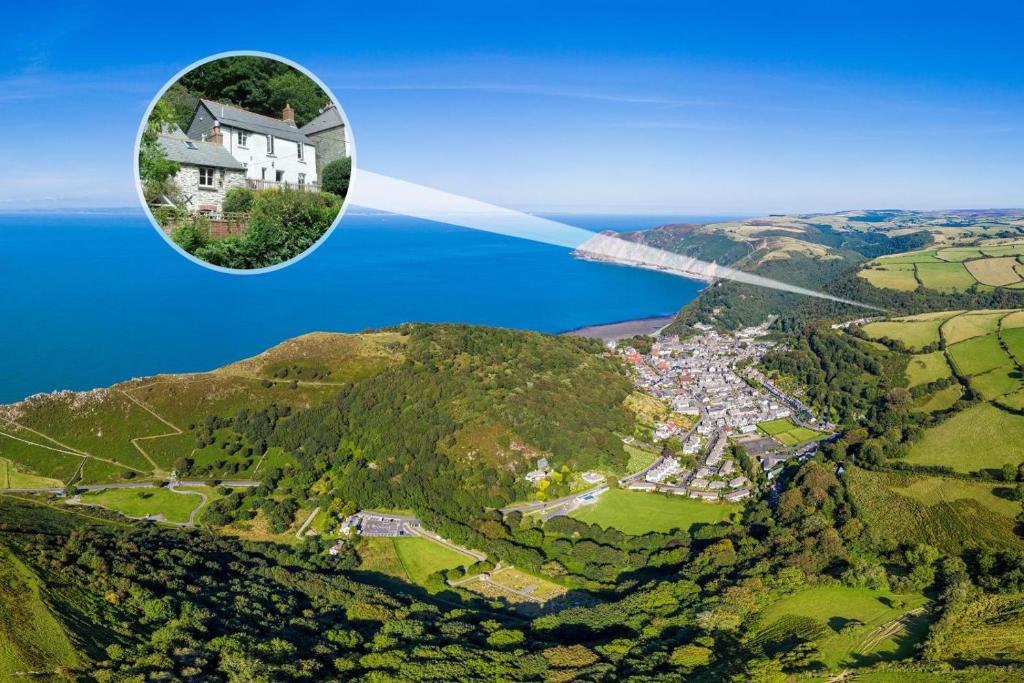 an image of a house on top of a hill at 2 Bed in Lynton oc-trelyn in Lynmouth