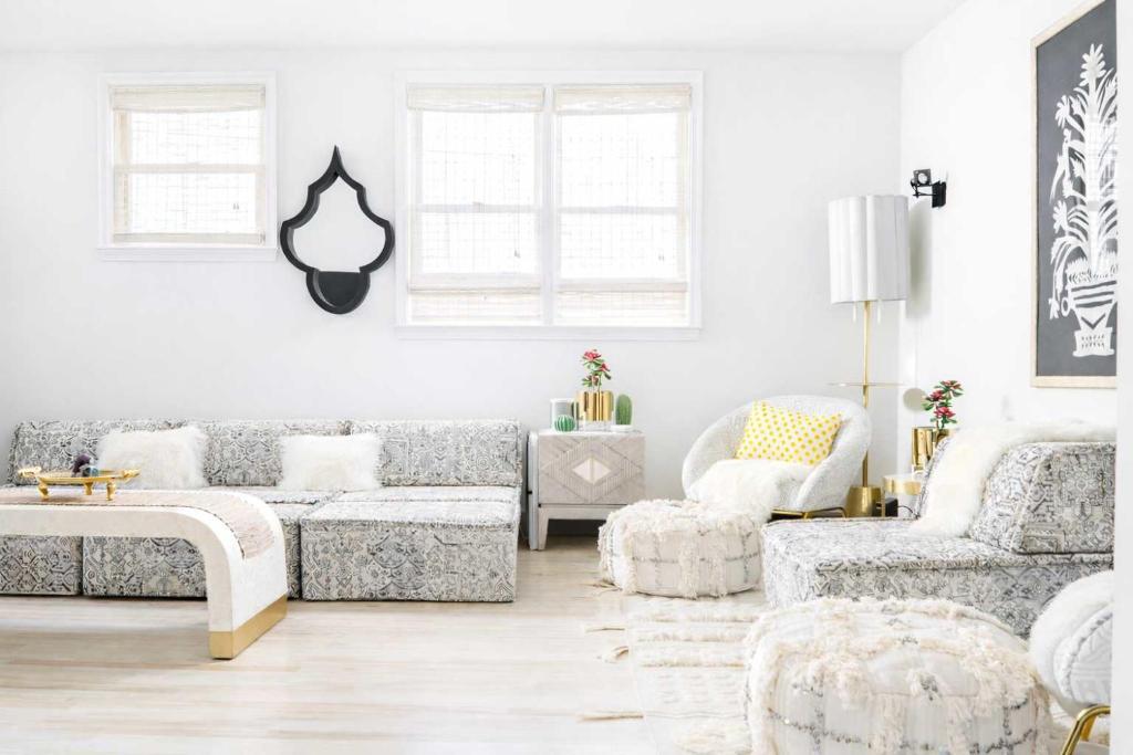 a living room with a couch and a chair at Boho Lux in Atlanta