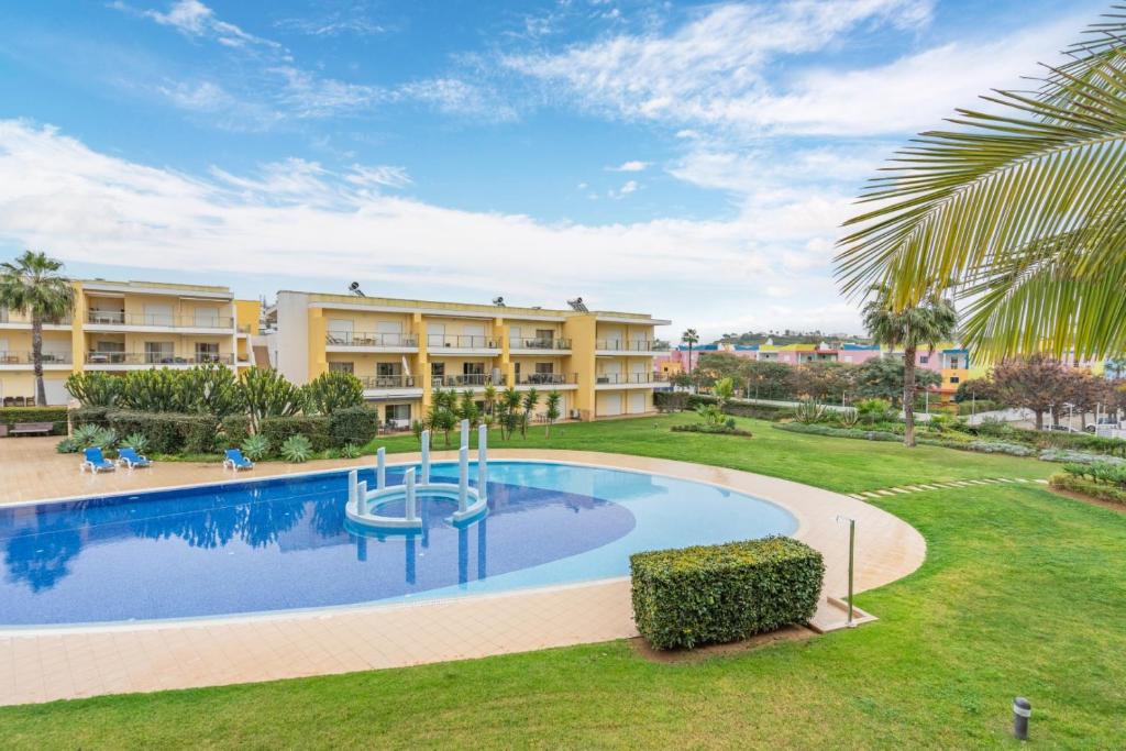 an image of a swimming pool at a resort at #010 Marina View Apartment Pool & Balcony in Albufeira