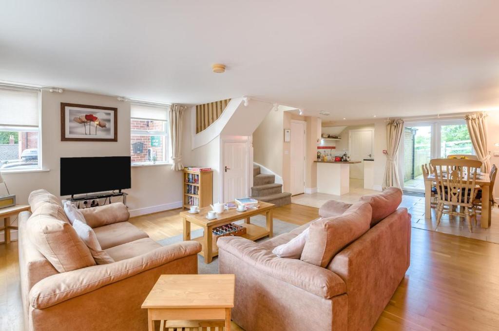 a living room with two couches and a tv at 2 Bed in Sledmere oc-ey103 in Sledmere