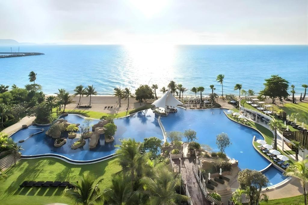 an aerial view of the water park at the resort at White Sands Beachfront l 2BR Condo with Ocean View in Na Jomtien