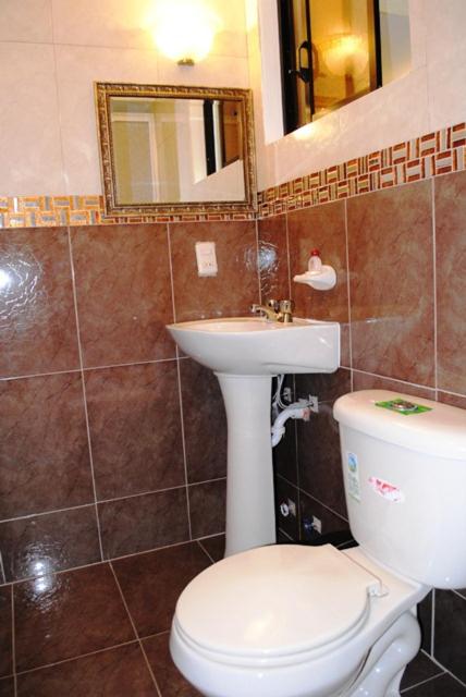 Koupelna v ubytování Hotel Caluva