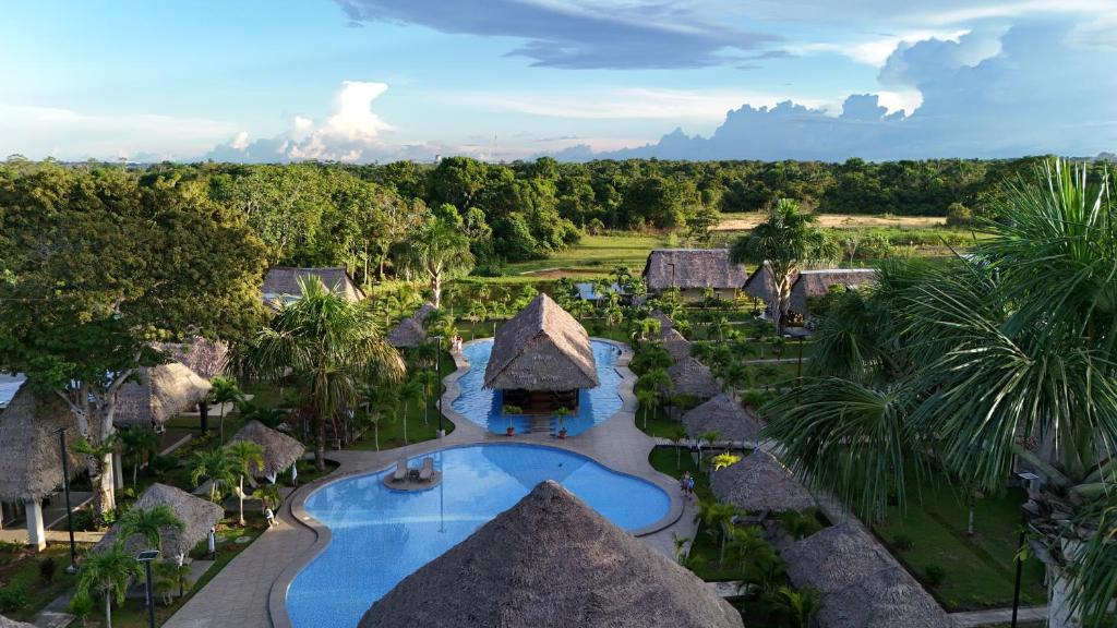 an aerial view of a resort with a swimming pool at Irapay Amazon Lodge in Padre Cocha