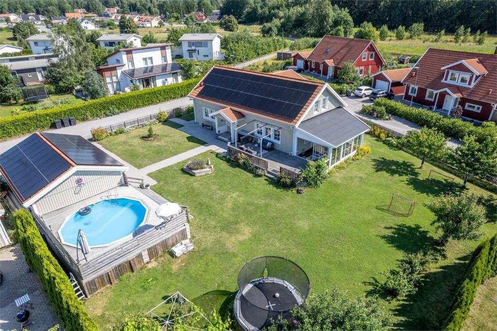 an aerial view of a house with a swimming pool at Luxury villa with pool in Bro