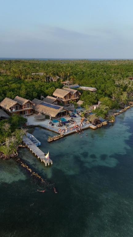 an aerial view of a resort in the water at Santa Lova Eco-hostel Isla Tintipan in Tintipan Island