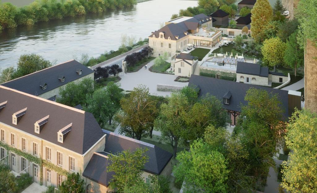 an artist rendering of the proposed redevelopment of a building on the river at Relais d'Amboise - The Leading Hotels of the World in Amboise