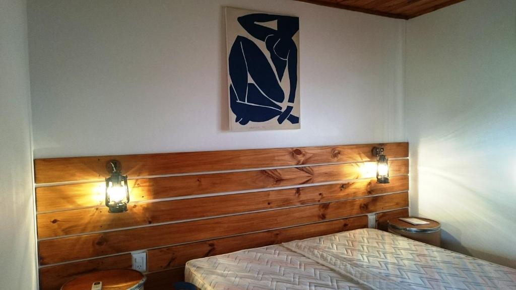 Postel nebo postele na pokoji v ubytování Cabañas 57