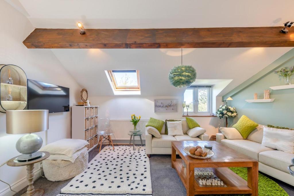 a living room with a couch and a table at 2 Bed in Horns Cross oc-l29271 in Bucks Mills